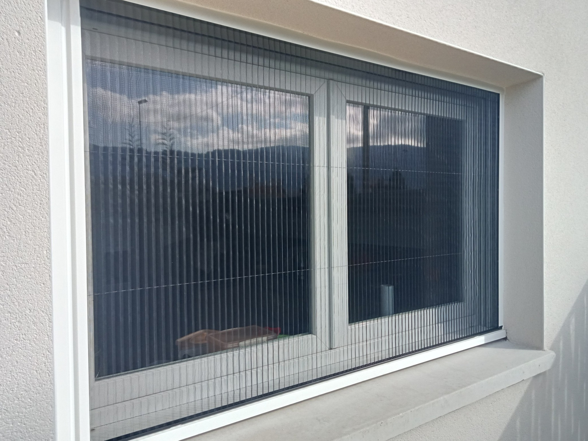 Moustiquaire plissée latérale – Haute-Savoie